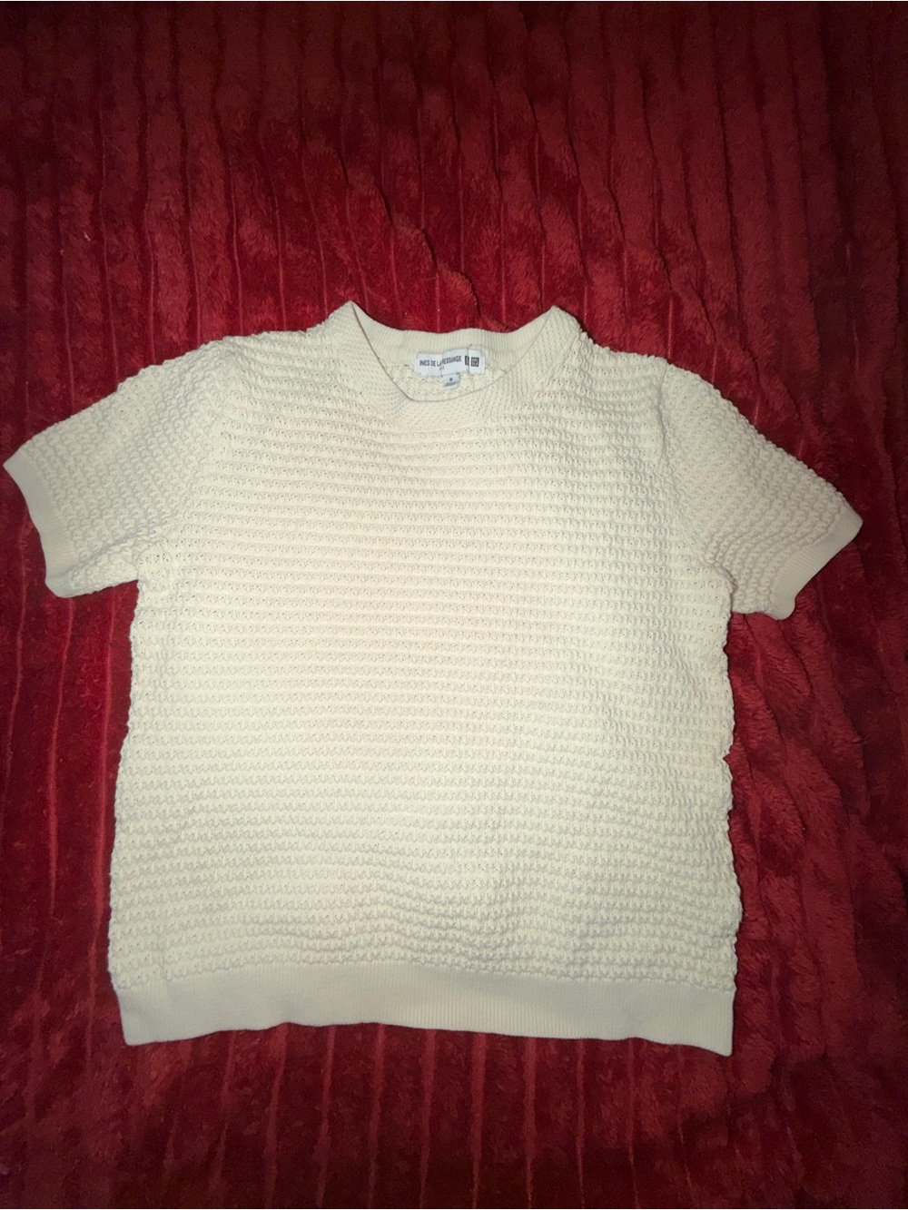 Uniqlo x Ines de la Fressange piece is a short-sleeved cotton knit pullover